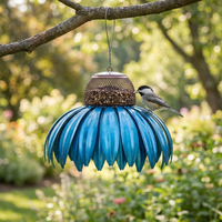 Bird feeder hanging in a garden lifestyle setting