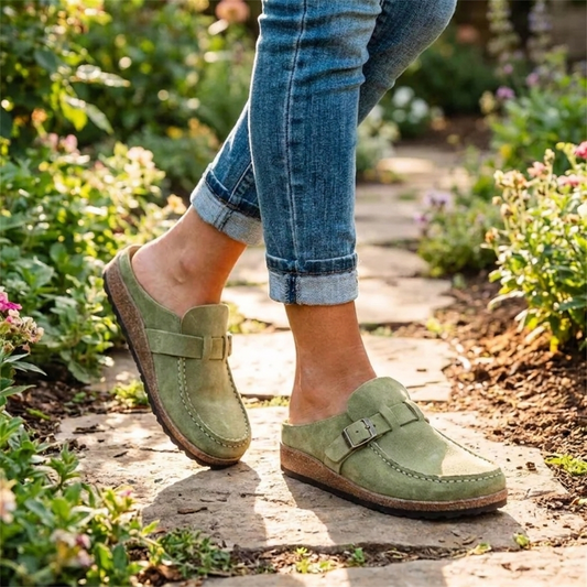 Orthopaedic clogs worn outdoors in a lifestyle setting