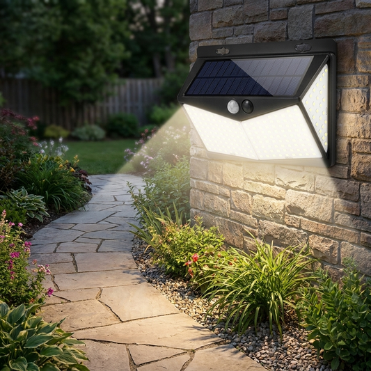 Outdoor solar light illuminating a garden pathway at dusk