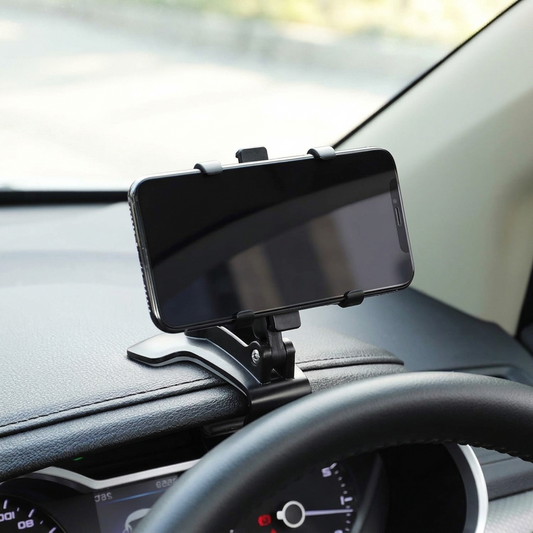 Car phone holder mounted on a car dashboard holding a phone