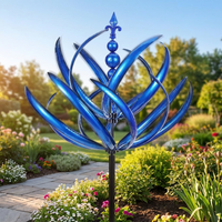 Metal wind spinner spinning in a garden on a sunny day
