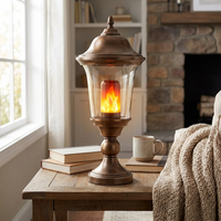 LED flame effect light bulb installed in a lamp in a cozy home interior