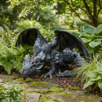 Crouching dragon guardian statue placed as garden decor