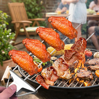 Grill skewer set grilling food at an outdoor BBQ