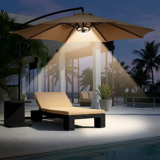 Illuminated patio parasol lighting at dusk