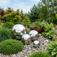 Stainless steel viewing balls placed as garden decor
